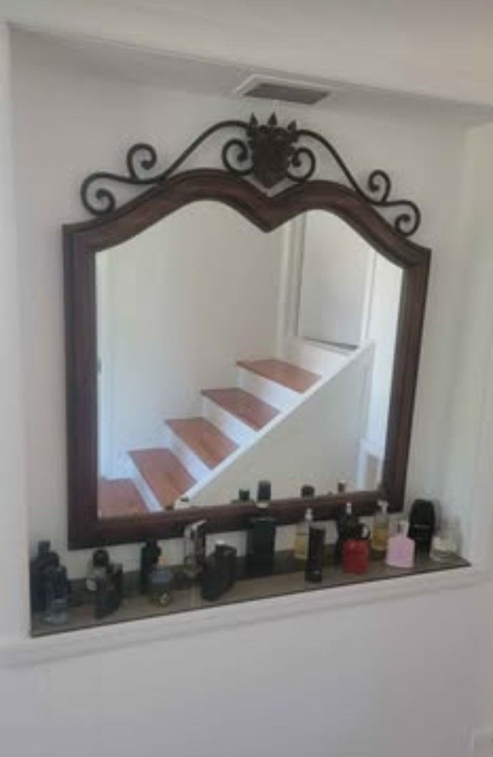 Beautiful wood and wrought iron Drexel mirror. 39 x 42H