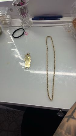 10k gold 25 grams 6mm rope chain San Judas pendant , 100 bill pendant