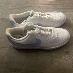 White And Blueish Nikes Shoes