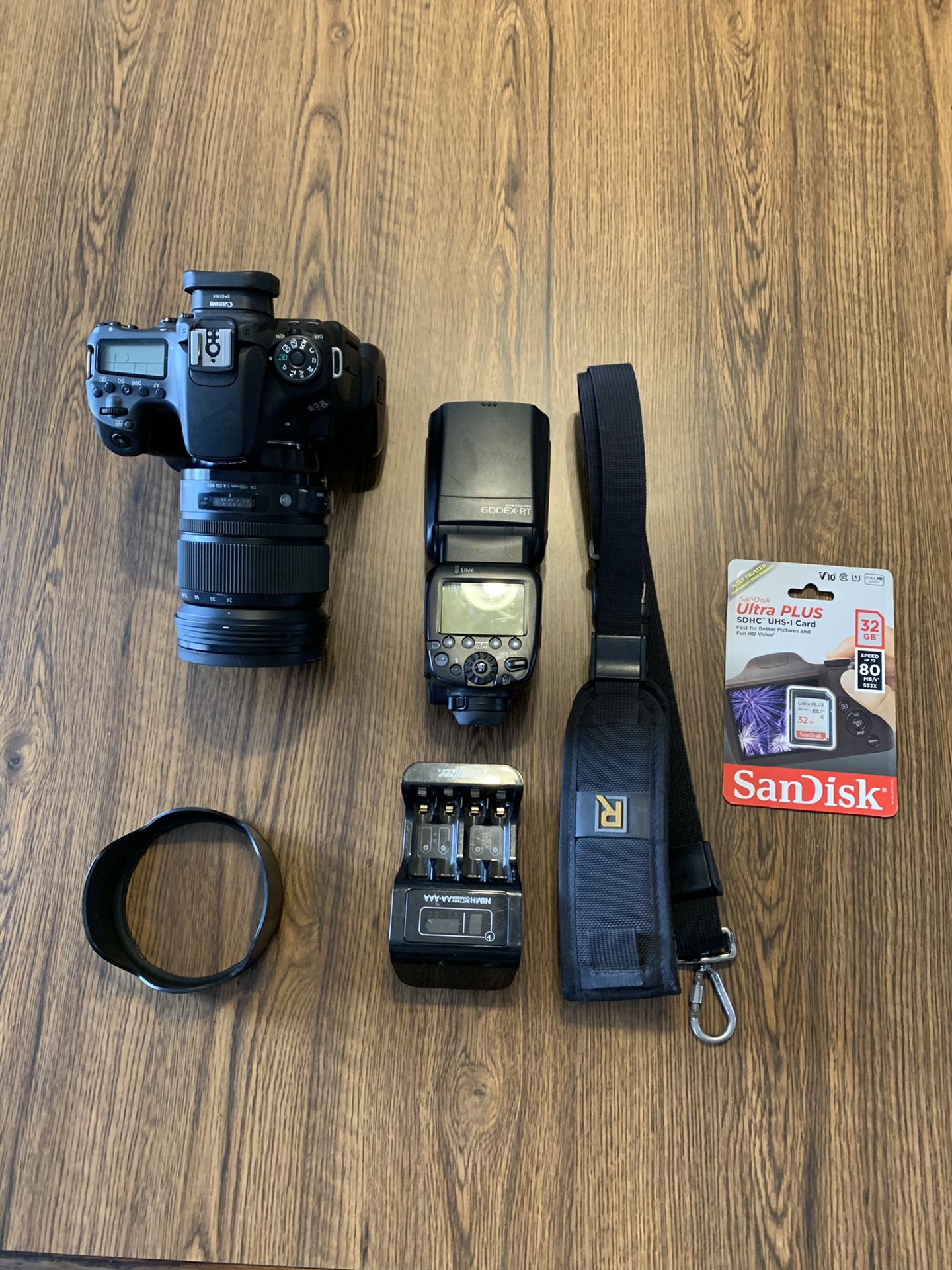 Canon ESO 70D W/sigma 24-105 MM 1:4 DG 82 MM Lens W/ Canon 600EX-RT Flash W/ Canon Camera Back Pack. Plus More.