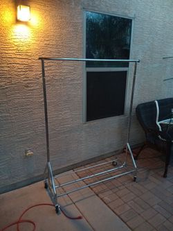 Brand New Rolling and Adjustable Chrome Garment Rack