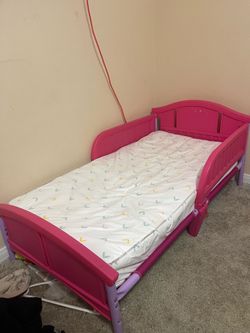Pink toddler bed
