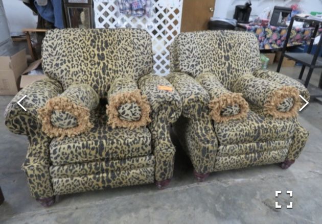 PAIR OF BARCALOUNGER ANIMAL PRINT UPHOLSTERED RECLINERS W THROW PILLOWS