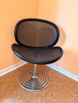 Mid-century modern design, black leather and mesh office or side chair
