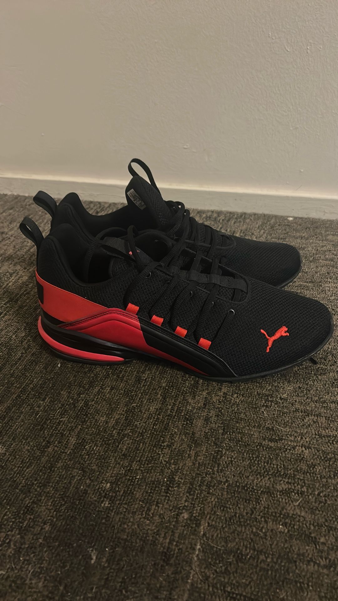 Red And Black Pumas