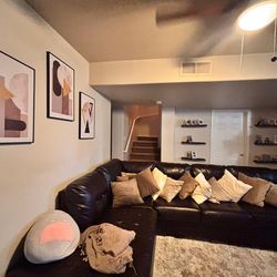 Couch, Paintings, Rug, Pillows All Together