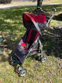 The First Years Ignite Stroller in a red and gray color scheme