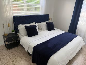 Navy Blue Tufted Upholstered Bed Frame with mattress