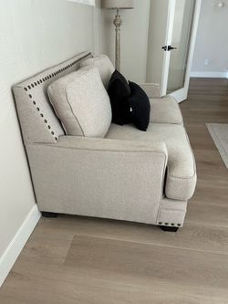 Cream loveseat