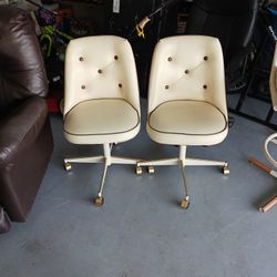 Two Leather Chairs