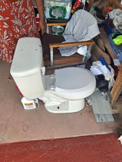White Toilet with Tank and Seat