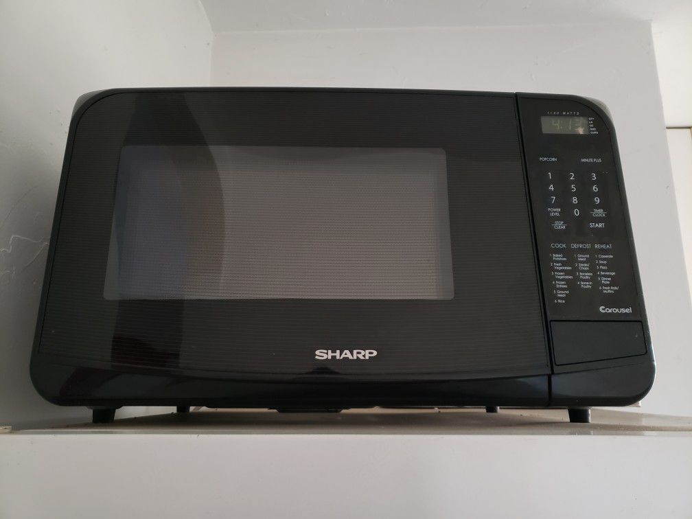 sharp r-305hk 1100 watt microwave black