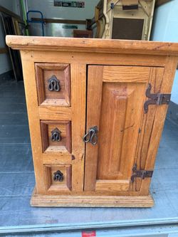 Rustic Pine Wood Cabinet with Iron Hardware