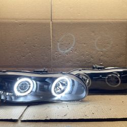 #OH70 98-02 Chevy Camaro Halo LED Black Halogen Headlight Pair 