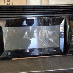 Space Saver microwave mounted under cabinet. Photo posted by
