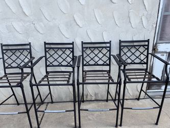 Four steel frame chairs