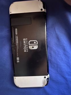 Nintendo switch with white controllers