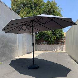 New in Box $130 Large Double Sided Outdoor (15ft Umbrella and 65lbs Plastic Base set) Colors Red/Gray
