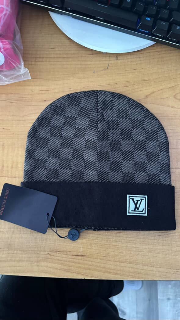 Two Louis Vuitton beanies $90 each