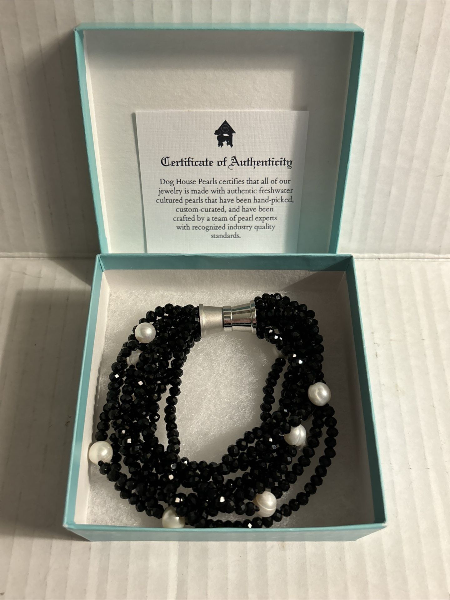 Dog House Pearl Nine-strand black crystal and pearl bracelet