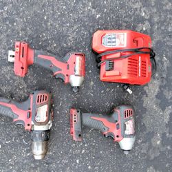 Two Quarter Inch Impacts Half Inch Drill And Rapid Charger