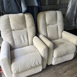 2 Swivel Based Chairs 
