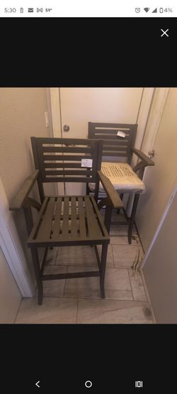 2 tall patio chairs