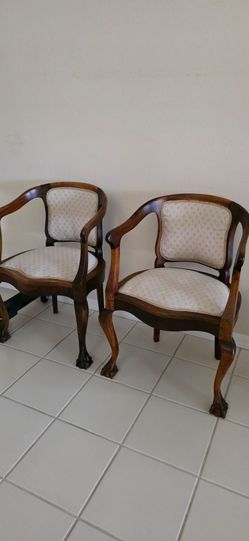 Two Antique Stinkwood Armchairs