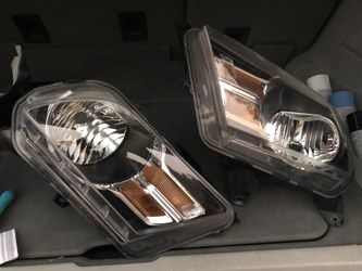 10-12 mustang stock headlights