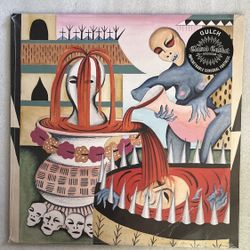  The Gulch Impenetrable Cerebral Fortress Vinyl LP Record is a 12" colored vinyl in mint condition, featuring a closed casket design. This album, by t