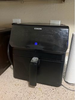 Air fryer/ Microwave/ Blk Glass top table/ Trash can/ Vaccum