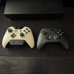 1TB SSD U Xbox One X W/ Kinect+ adapter plus more