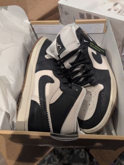 Air Jordan 1 Mid Black and White Sneakers