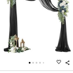 Wedding arch with teal and black drape cloth