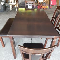 Table And 4 Chairs And 1 Stool