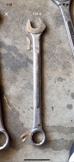 Metal wrench has 1-3/8 inch