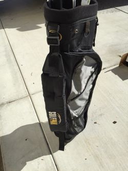 Golf bag with some clubs