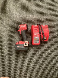 Milwaukee M18 Fuel1/4" Impact Driver 5.0 Ah Battery and Charger