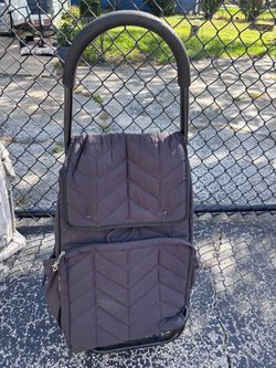 Bag on wheels. Lots of pockets