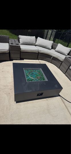A very large outside patio set from Ashley furniture