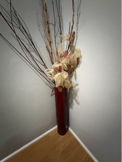 Decorative standing vase with flowers