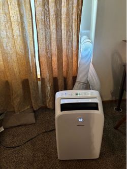 Hisense portable A/C with parts.