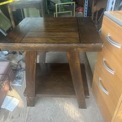 Nice wood table it’s 24 inches tall 21 inches wide and  24 inches deep