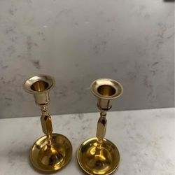 A Pair Of Gold Candle Holder