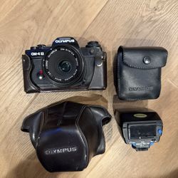 Olympus OM-4 T w/ Flash And Lens