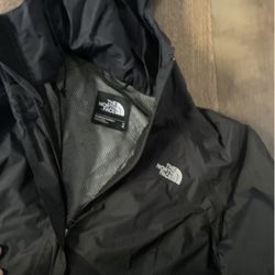 Woman’s Sm Black Raincoat 