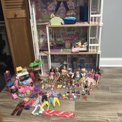 a BUNCH of toys!! and BARBIE HOUSE