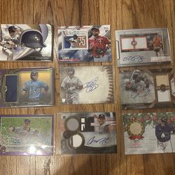 Sports card lot of 44 auto, numbered, and patch