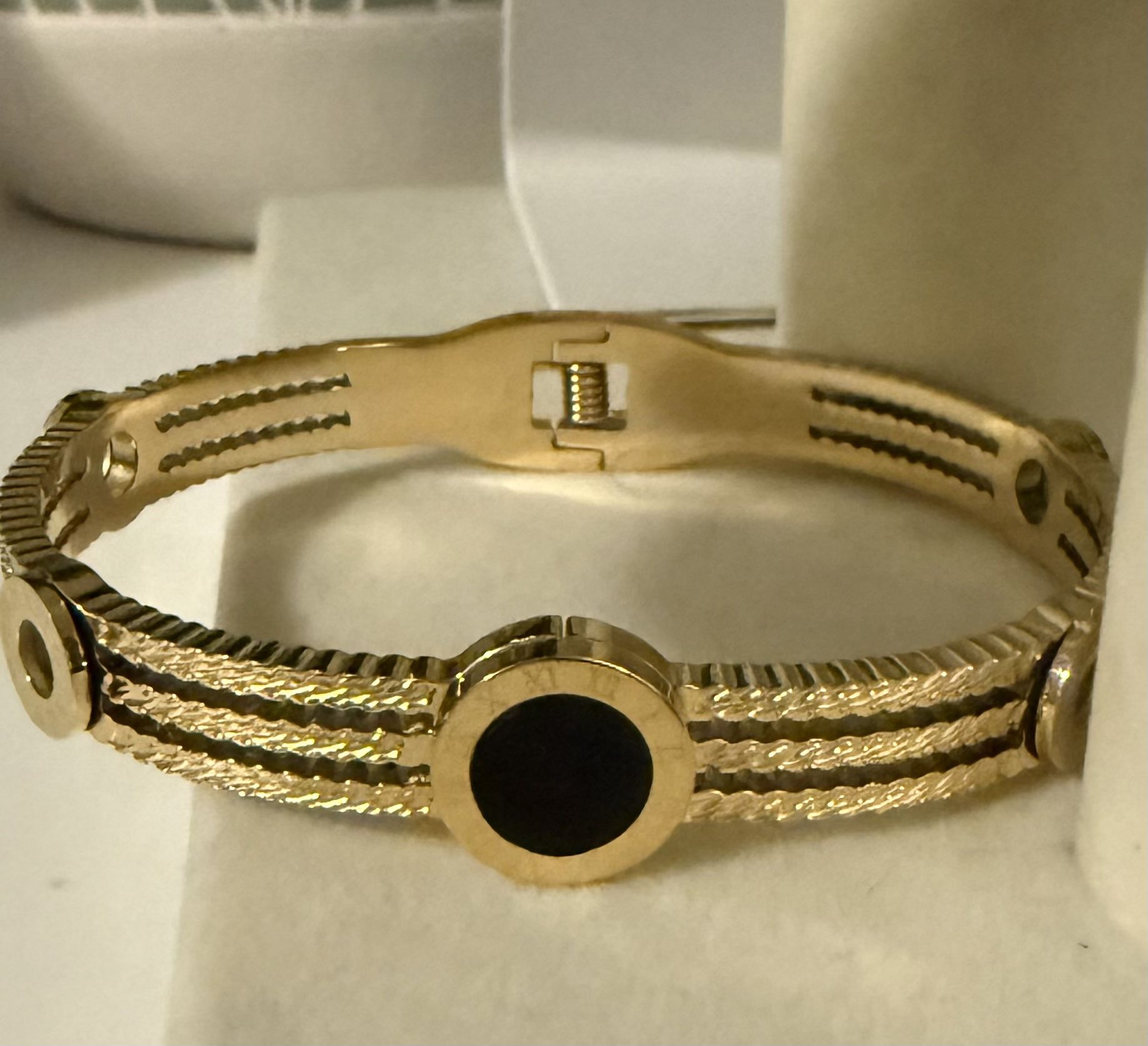 Gold and Black Braided Bracelet with Gemstone Halo