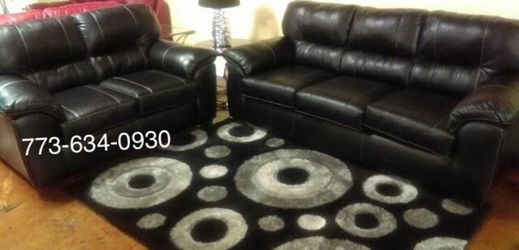 Brand new black leather sofa and loveseat!! Free Delivery